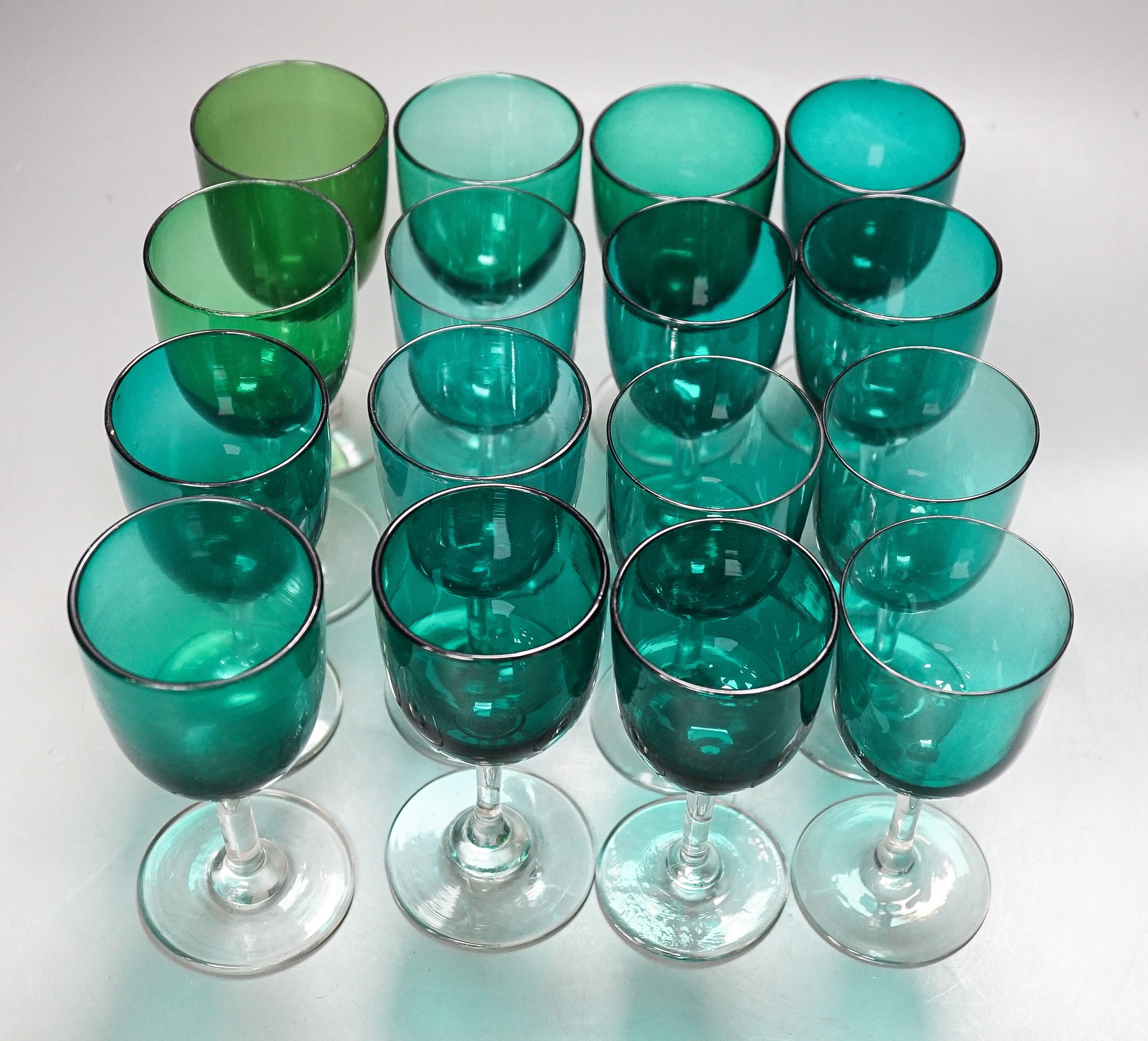 A sixteen green wine glasses, 19th/20th century